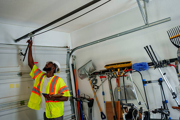 Professional Garage Door Spring Repair technician working in West Peoria, IL